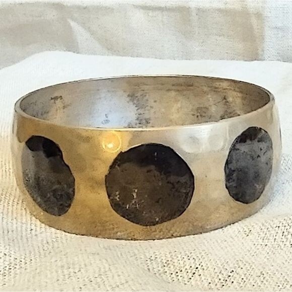 Silvertone Metal Polka Dot Hammered Bangle Bracelet - Picture 3 of 3